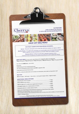 Cherry's dropoff BBQ catering menu on clipboard